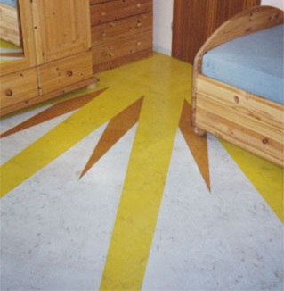 Korkboden mit Intarsie Sonne im Kinderzimmer